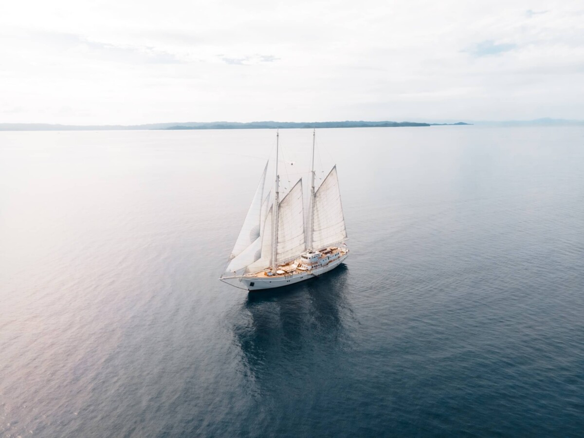 an aerial shot of a luxury yacht in Indoneisa